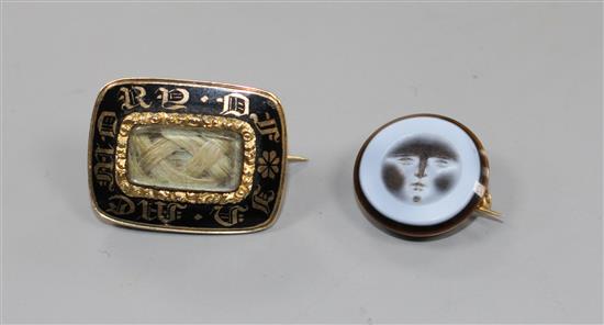 Two brooches.